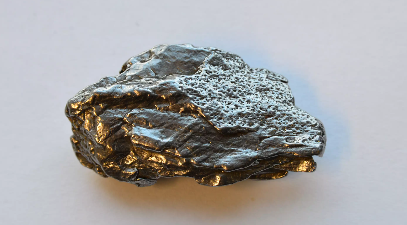 A Role For Meteoritic Iron In The Emergence Of Life On Earth