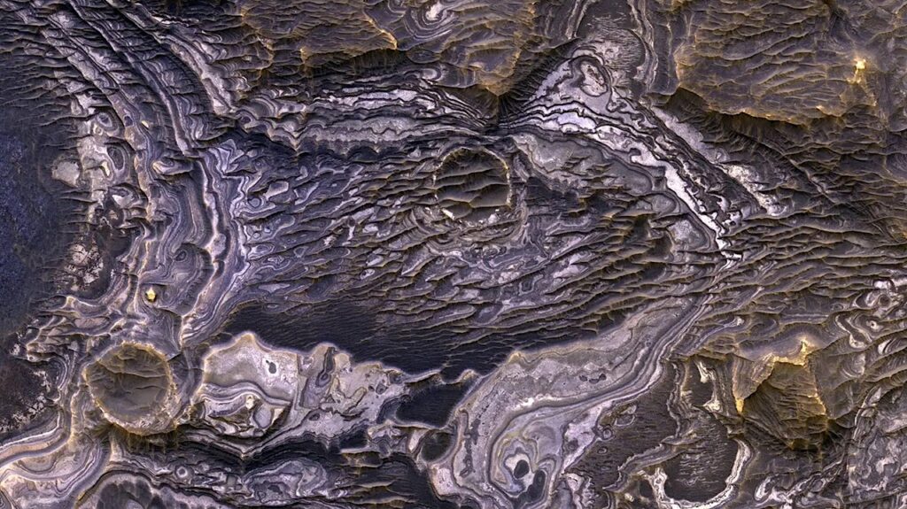 How Ash and Water Intricately Sculpted the Surface of Mars