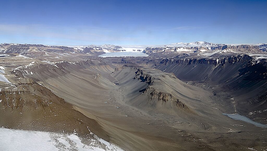 Characterizing Microbial Communities in >7000- and >180,000-Year-Old Antarctic Permafrost Using a Low-Biomass Decontamination Protocol