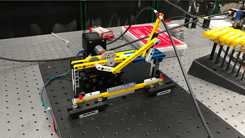 Crank-rocker Optical Fiber Mode Scrambler Prototype For The GMT-Consortium Large Earth Finder (G-CLEF)