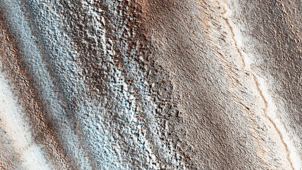 A Slash Across Layered Deposits At Mars’ North Pole