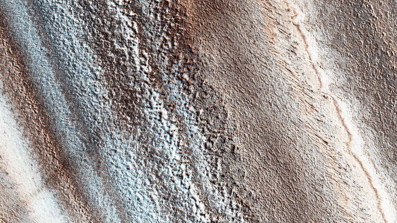 A Slash Across Layered Deposits At Mars’ North Pole