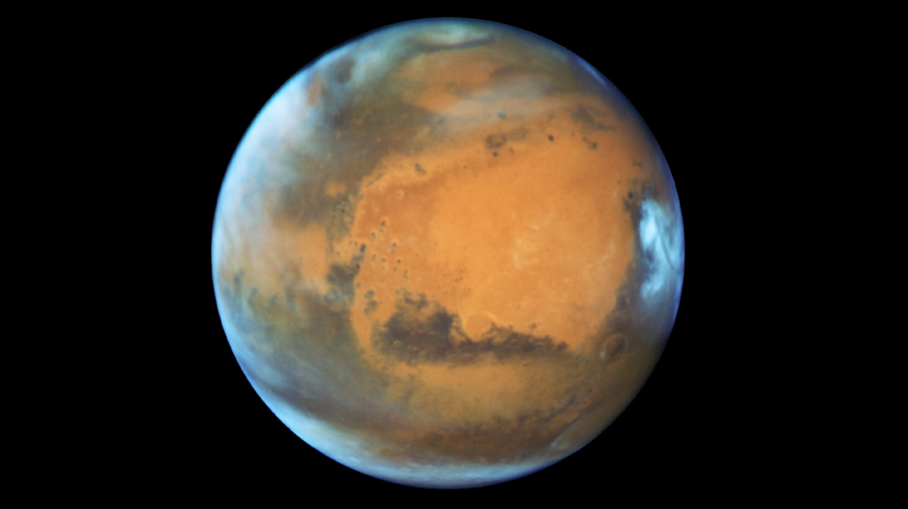 Astrobiological Implications of Lava Flows Superposed on Martian Glaciers